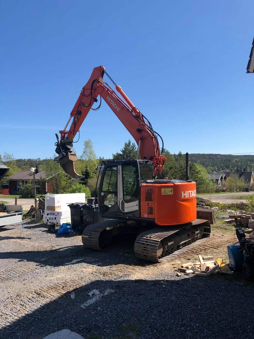 Hjulgrävaren Hitachi 145 på en arbetsplats